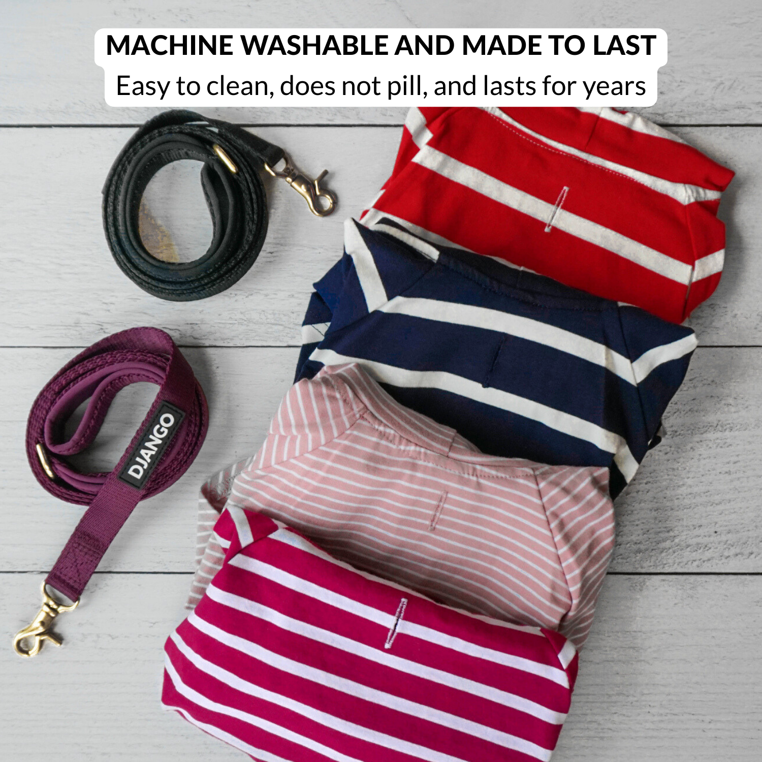 Folded striped shirts and a purple dog leash on a wooden surface with text about machine washability.