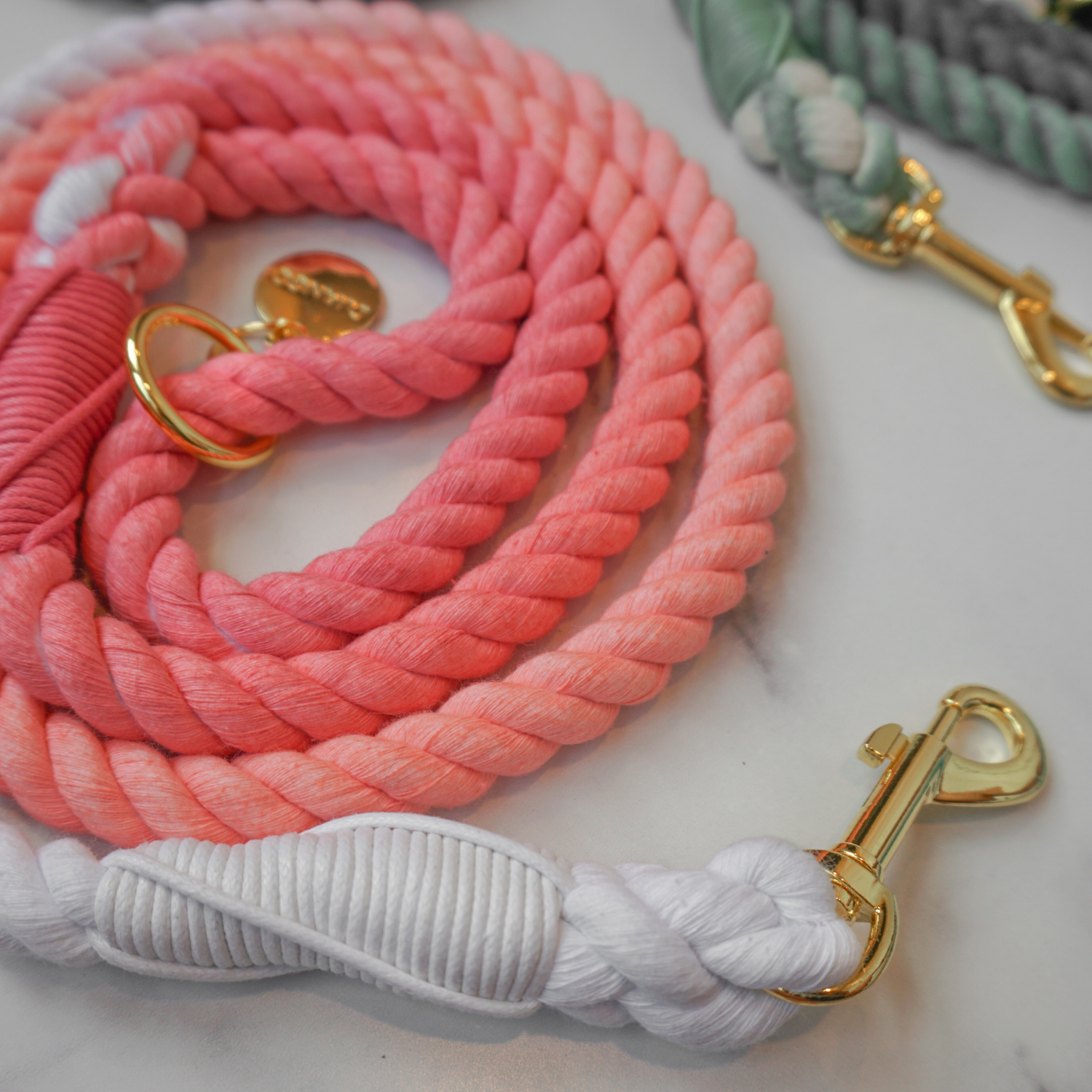 Handcrafted from premium cotton rope, this pink ombre dog leash offers superior durability and a soft, comfortable grip.