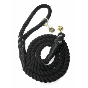 DJANGO Black Cotton Rope Dog Leash - You and your dog will be the most stylish ones on the sidewalk with this handcrafted and hand-dyed green ombré cotton rope leash. Crafted from soft and flexible three-strand natural cotton rope, the rope leashes are hand-spliced and the ends whipped, resulting in an incredibly strong yet effortlessly chic and comfortable dog lead. Gold hardware adds additional sophistication to the stylish dog lead. Leash length measures 5 feet (152 cm) - djangobrand.com