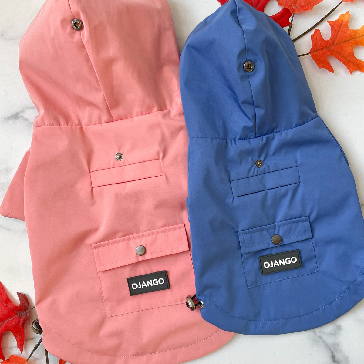Quartz Pink and Mariner Blue Highland Dog Jackets & Raincoats showing adjustable hoods, back pockets, and weather-ready design