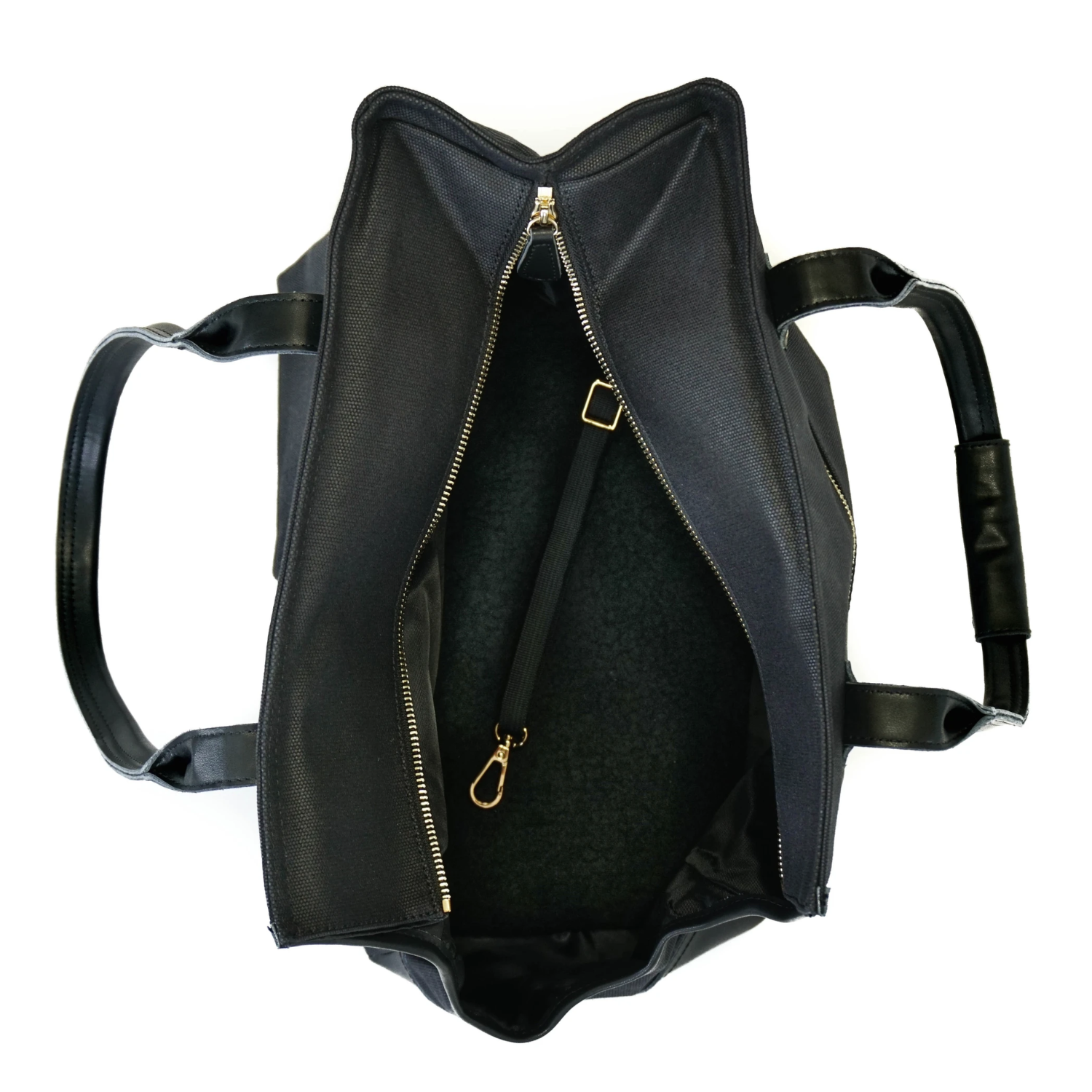 Interior of black dog carrier tote bag showing soft, supportive base, safety leash for security, and a top zipper flap for safety