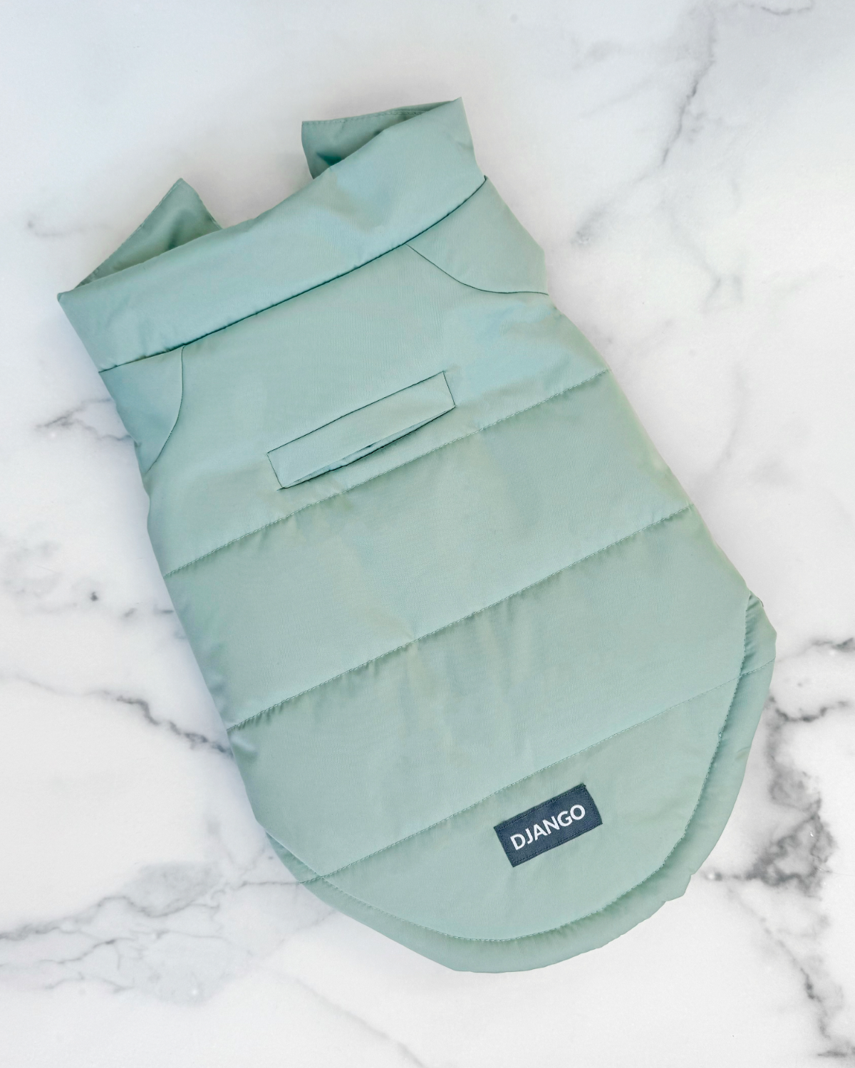 The Snowline™ Puffer Dog Coat in sea foam green is the best winter coat for dogs including dachshunds, Chihuahuas, Boston terriers, beagles, Yorkies, cockapoos, cavalier king charles spaniels, and more
. Insulated, water-repellent, and designed for warmth, it’s the ultimate cold-weather dog jacket.