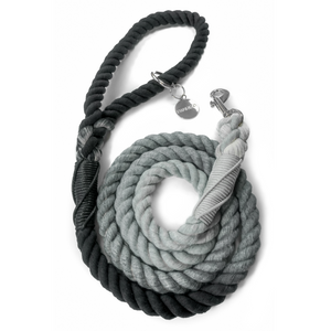 DJANGO's Poppy Seed Gray Ombre Cotton Rope Dog Leash - You and your dog will be the most stylish ones on the sidewalk with this handcrafted and hand-dyed green ombré cotton rope leash. Crafted from soft and flexible three-strand natural cotton rope, the rope leashes are hand-spliced and the ends whipped, resulting in an incredibly strong yet effortlessly chic and comfortable dog lead. Silver hardware adds additional sophistication to the stylish dog lead. Leash length is 5 feet (152 cm) - djangobrand.com