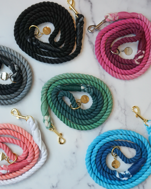 DJANGO Black Cotton Rope Dog Leash - You and your dog will be the most stylish ones on the sidewalk with this handcrafted and hand-dyed green ombré cotton rope leash. Crafted from soft and flexible three-strand natural cotton rope, the rope leashes are hand-spliced and the ends whipped, resulting in an incredibly strong yet effortlessly chic and comfortable dog lead. Gold hardware adds additional sophistication to the stylish dog lead. Leash length measures 5 feet (152 cm) - djangobrand.com