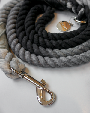 DJANGO's Poppy Seed Gray Ombre Cotton Rope Dog Leash - You and your dog will be the most stylish ones on the sidewalk with this handcrafted and hand-dyed green ombré cotton rope leash. Crafted from soft and flexible three-strand natural cotton rope, the rope leashes are hand-spliced and the ends whipped, resulting in an incredibly strong yet effortlessly chic and comfortable dog lead. Silver hardware adds additional sophistication to the stylish dog lead. Leash length is 5 feet (152 cm) - djangobrand.com
